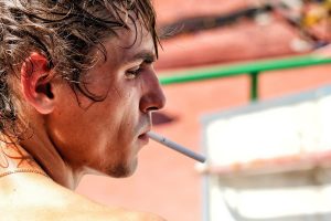 a man smokes after a boxing session